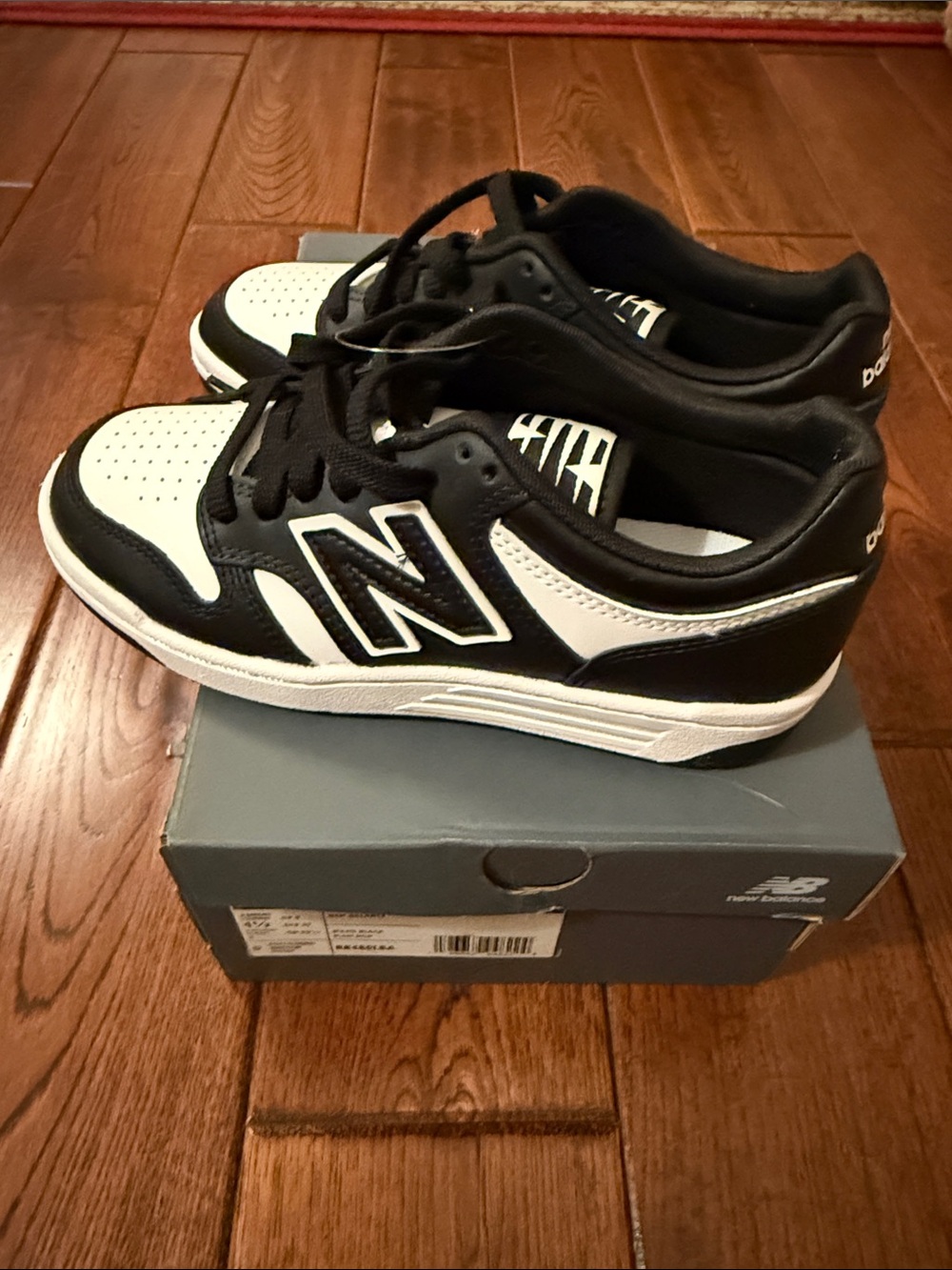 New Balance Men’s Black and White Low-Top Sneaker